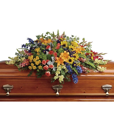 Colorful Reflections Casket Spray from Bakanas Florist & Gifts, flower shop in Marlton, NJ